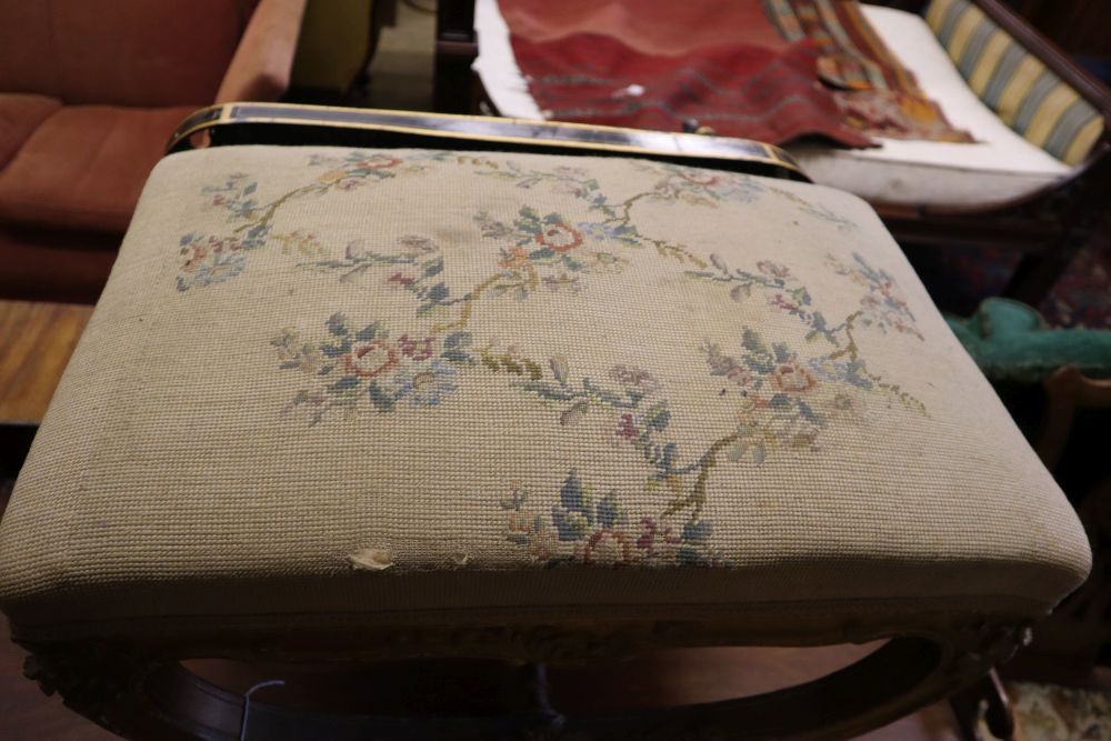 A 19th century giltwood X frame dressing stool, width 60cm, depth 40cm, height 46cm